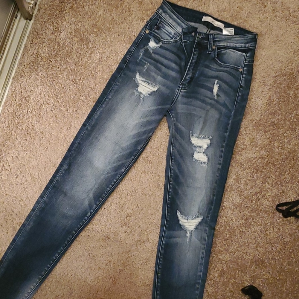 Never worn, looser fit